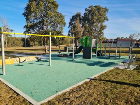 Oregon Playspace with swingset, slide and other play equipment