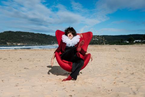 woman on beach n clown costume